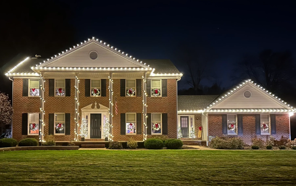 Youngstown Holiday Lighting on a Brick Home.
