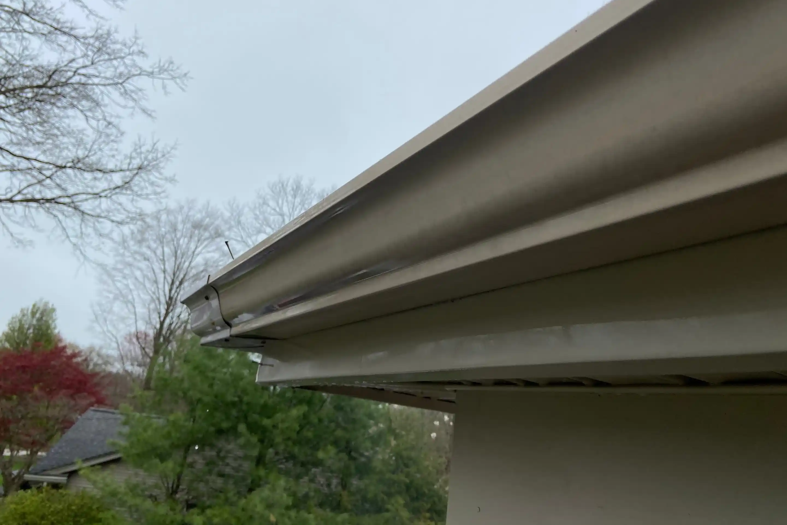 Gutters on a Howland Home After Being Pressure Washed and Cleaned.