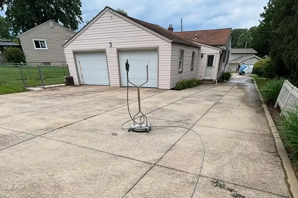 A Home with Dirty Concrete Waits to be Pressure Washed in Youngstown.