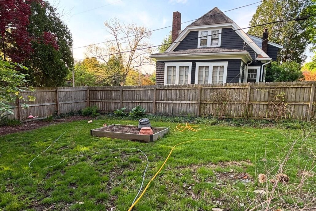 A Dirty Fence in New Middletown Before Being Pressure Washed.