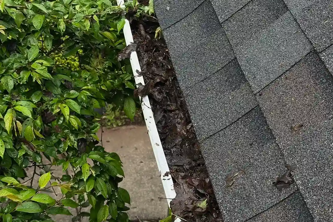 Clogged Gutters on a Boardman Home Before Being Pressure Washed.