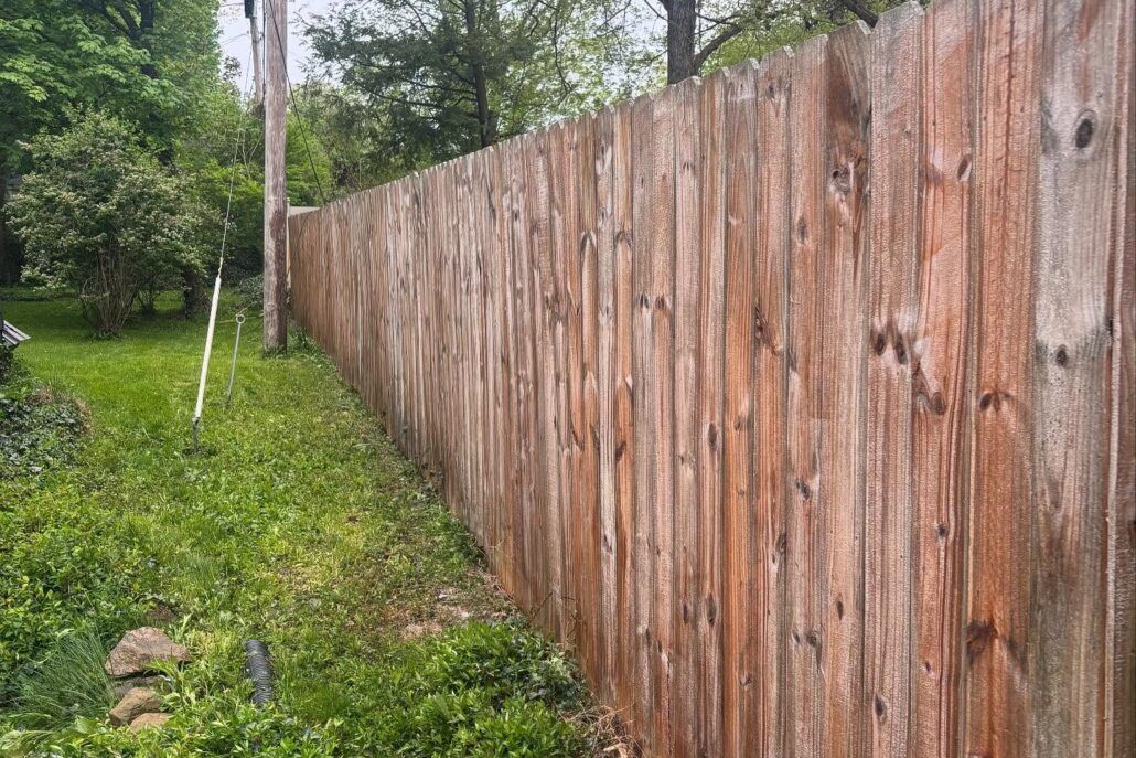 A Fence in New Middletown After Being Pressure Washed.